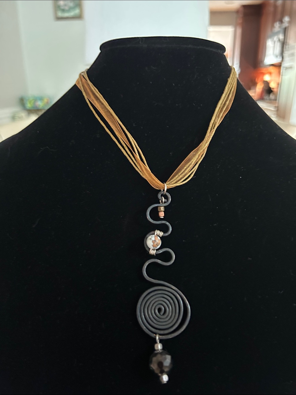 Black Spiral Pendant Necklace with Golden Multi-Strand Cord